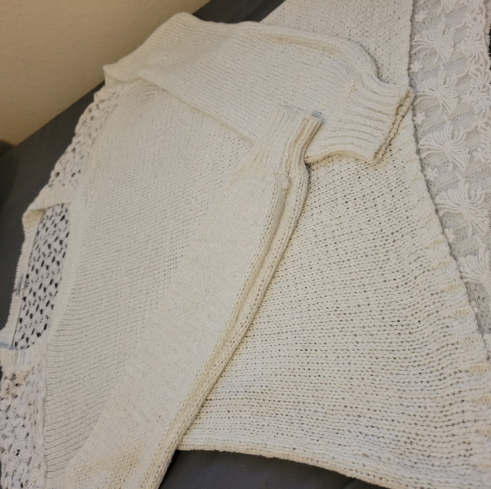 Women's white long-sleeve sweater with lace detailing